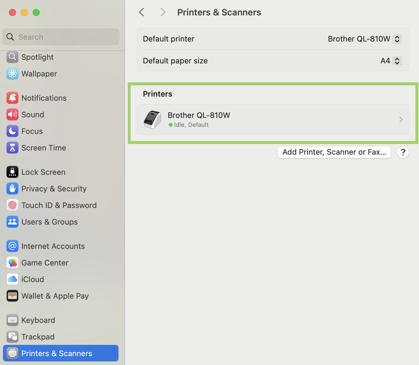 macOS System Settings showing Brother QL-810W listed under Printers & Scanners